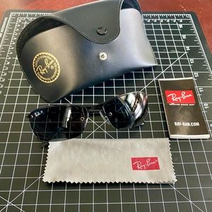 Ray-Ban Sunglasses by Luxottica, 100% UV Protection, Color black and grey.
